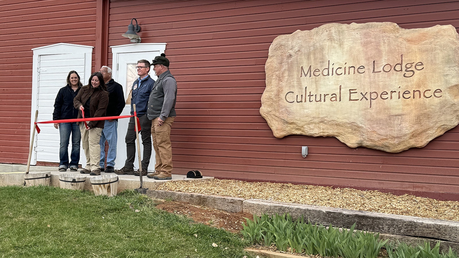 Representatives cut the ribbon for the Medicine Lodge Cultural Experience.  The project, funded with a grant from the Hemsley Charitable Trust, broke ground in 2021.