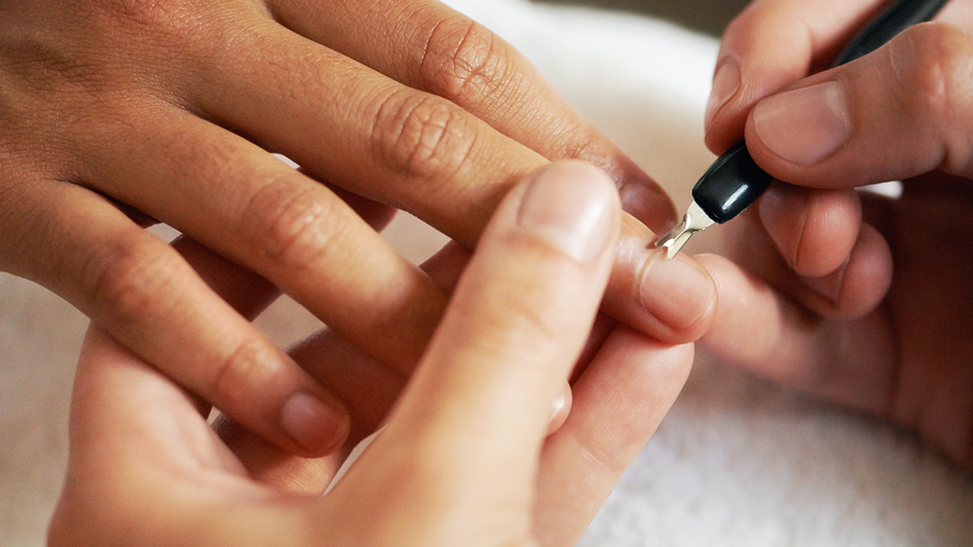 When using a cuticle remover, be careful not to go too deep, as this can cause the cuticle to bleed.