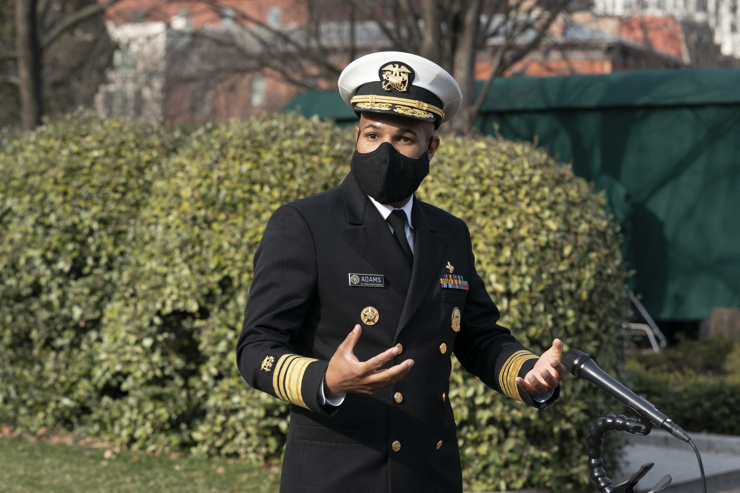 United States Surgeon General Jerome Adams takes questions from reporters outside the West Wing of the White House in 2020.